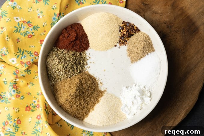 In as long as it takes to measure a few tablespoons of things, you can have the best Chicken Taco Seasoning you’ve ever tasted. Not only is it great on chicken tacos, but it’s wonderful on grilled, roasted, and air fryer chicken to boot! Homemade seasonings blends can be the difference between amazing and alright. When you make it at home, you are able to use the freshest spices and herbs and that makes an impact you won’t believe until you taste it.