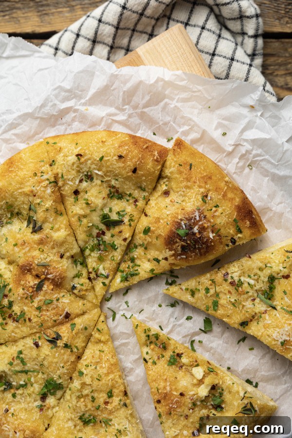 Close up of garlic pizza slice
