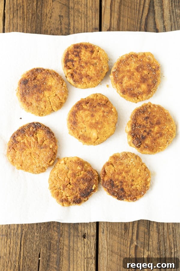 Crispy salmon patties in pan