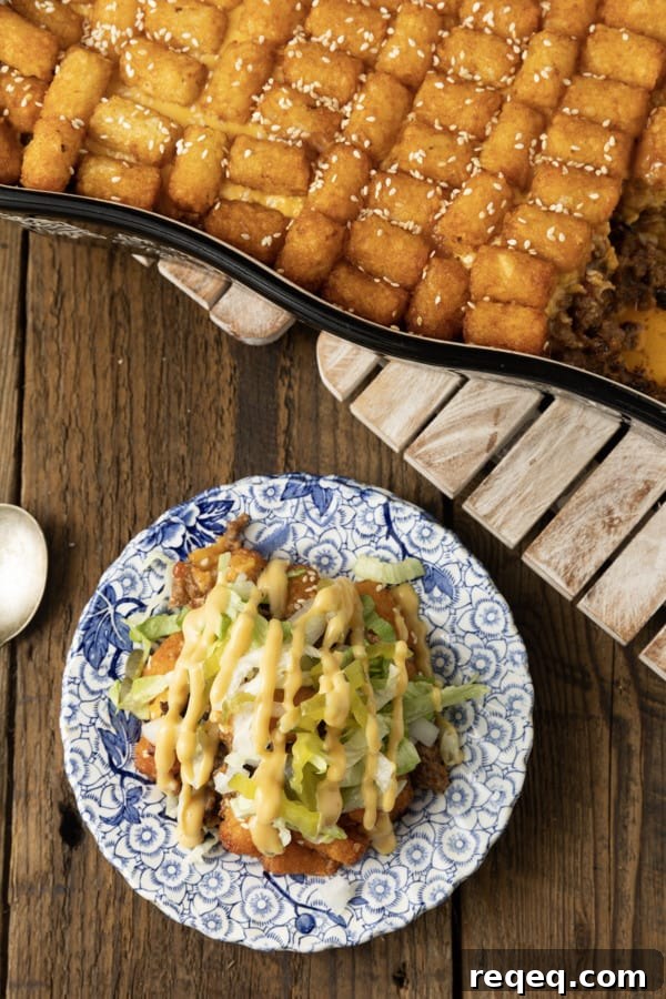 Big Mac Casserole Recipe: Easy Homemade Cheeseburger Bake 6 Big Mac Casserole: Saucy ground beef that tastes just like a Big Mac topped with melty cheese and tater tots then baked to bubbly, crispy tater tots topped perfection. This delicious meal the whole family will love is served with your favorite burger toppings like fistfuls of shredded lettuce, diced onion and dill pickle, and drizzled with "special sauce" or thousand island dressing. And while this twist on classic comfort food might sound weird, it is a great family dinner.