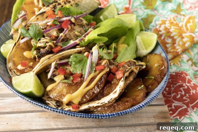 Jerk Chicken Tacos with Pineapple Salsa & Lime Crema 3 Make taco nights magical with jerk chicken tacos! Fresh lettuce leaves stacked on charred tortillas are piled high with juicy jerk chicken, grilled pineapple slices, diced bell peppers, thinly sliced onions, a drizzle of sauce or spoonful of mango salsa.