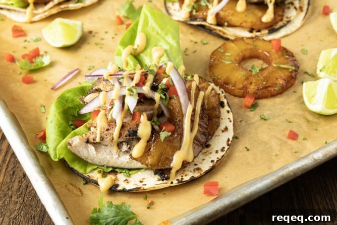 Jerk Chicken Tacos with Pineapple Salsa & Lime Crema 5 Make taco nights magical with jerk chicken tacos! Fresh lettuce leaves stacked on charred tortillas are piled high with juicy jerk chicken, grilled pineapple slices, diced bell peppers, thinly sliced onions, a drizzle of sauce or spoonful of mango salsa.