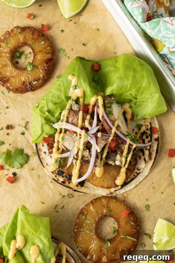 Jerk Chicken Tacos with Pineapple Salsa & Lime Crema 6 Make taco nights magical with jerk chicken tacos! Fresh lettuce leaves stacked on charred tortillas are piled high with juicy jerk chicken, grilled pineapple slices, diced bell peppers, thinly sliced onions, a drizzle of sauce or spoonful of mango salsa.