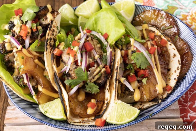 Jerk Chicken Tacos with Pineapple Salsa & Lime Crema 8 Make taco nights magical with jerk chicken tacos! Fresh lettuce leaves stacked on charred tortillas are piled high with juicy jerk chicken, grilled pineapple slices, diced bell peppers, thinly sliced onions, a drizzle of sauce or spoonful of mango salsa.