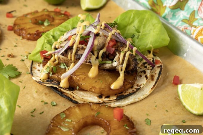 Jerk Chicken Tacos with Pineapple Salsa & Lime Crema 9 Make taco nights magical with jerk chicken tacos! Fresh lettuce leaves stacked on charred tortillas are piled high with juicy jerk chicken, grilled pineapple slices, diced bell peppers, thinly sliced onions, a drizzle of sauce or spoonful of mango salsa.