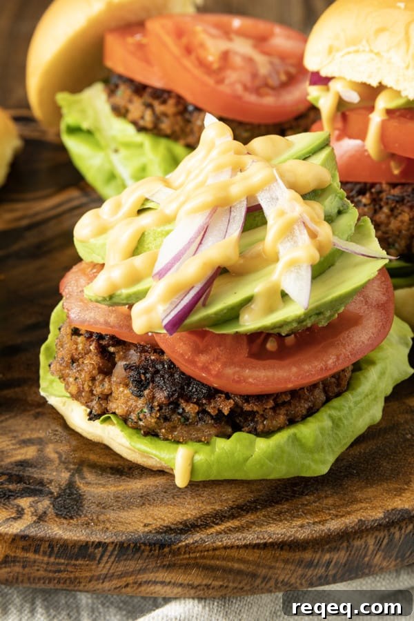 Black Bean and Quinoa Burgers with Avocado Cilantro Sauce 5 Full of fantastic texture and nobbly with black beans, these hearty and flavourful black bean quinoa burgers made with simple ingredients satisfy serious veggie burger cravings and big taste.