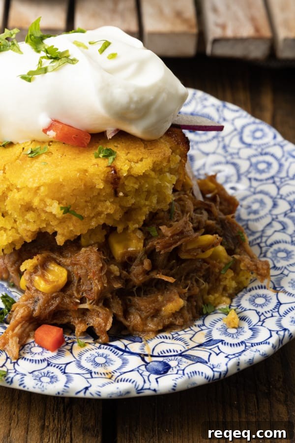 Cheesy Pulled Pork Casserole with Crispy Topping 6 Pulled Pork Casserole in baking dish before topping.