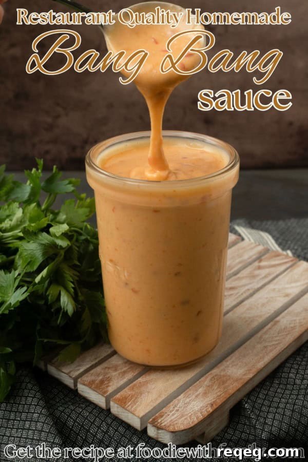 bang bang sauce in a jar with a text overlay describing the photo