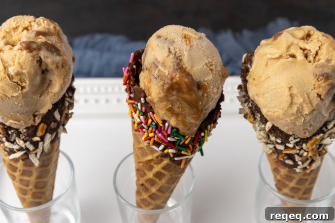 Creamy Dulce de Leche Ice Cream Recipe – Homemade Argentine Flavor 3 Three dulce de leche ice cream cones with toppings on top.