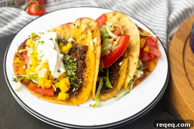 smashed tacos on stacked plates