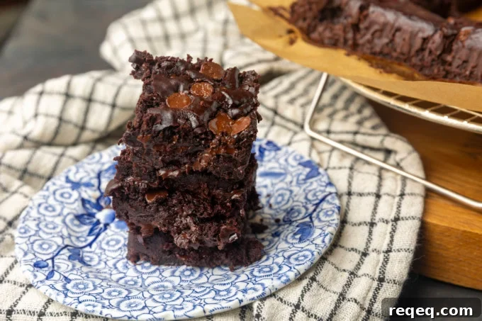 Fudgy Greek Yogurt Brownies with Extra Moist Texture 5 Greek yogurt brownies eggless brownies on a plate