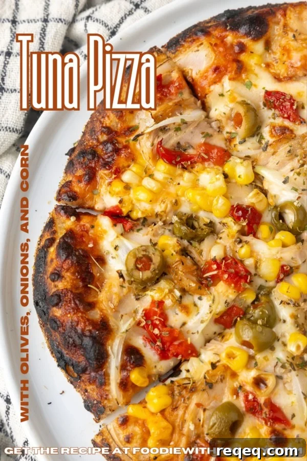 tuna pizza with corn, olives, onions, and roasted red peppers