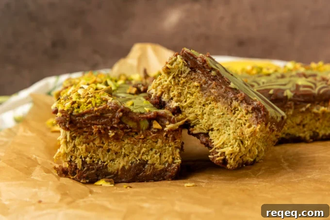 Decadent Dubai Chocolate Brownies Recipe — Rich, Fudgy Squares 3 Viral Dubai Chocolate Brownies on parchment paper