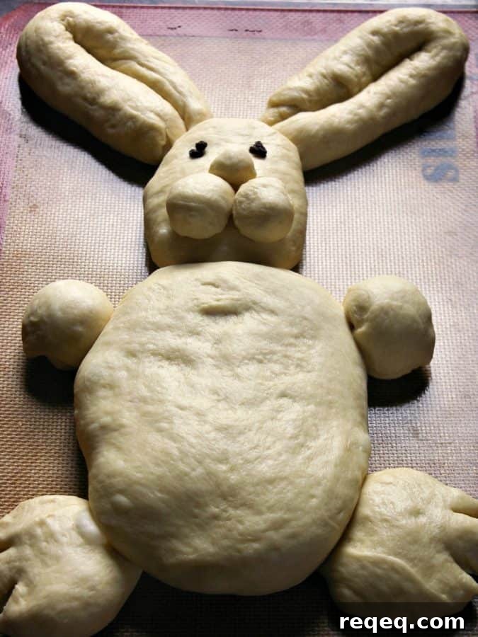 Easter Bunny Bread Recipe: How to Make Adorable Holiday Loaves 4 bread dough shaped like bunny on baking sheet