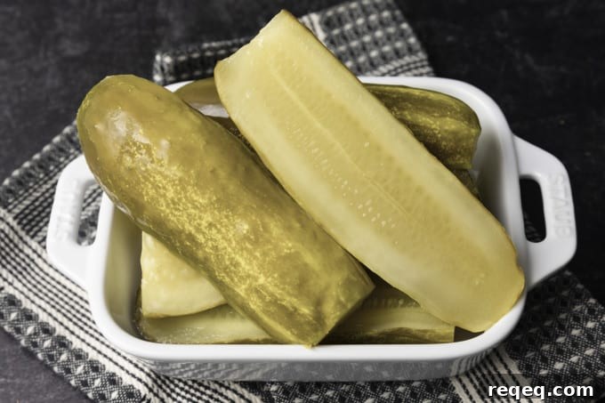 Copycat Claussen Pickles Recipe: Crisp Refrigerator Pickles You Can Make at Home 3 Crisp dill pickles ready to eat