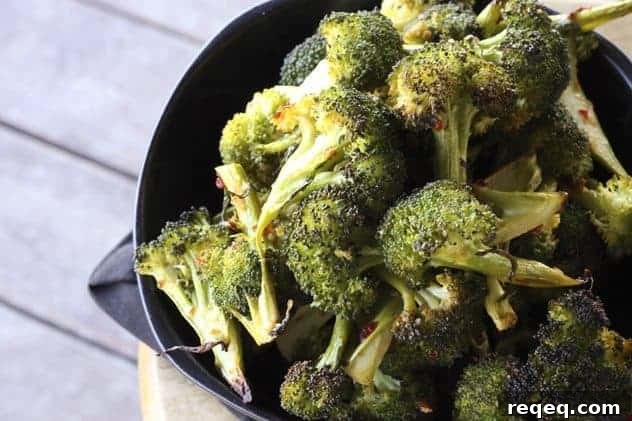 Spicy Asian-Style Broccoli Stir-Fry Recipe 2 Spicy Asian Broccoli: Long spears of broccoli are tossed with Chinese chile-garlic sauce, minced fresh garlic, sesame oil, a bit of raw sugar and this and that then roasted until crisp-tender. This will beat every white cardboard takeout container of Chinese you can get anywhere without exception.