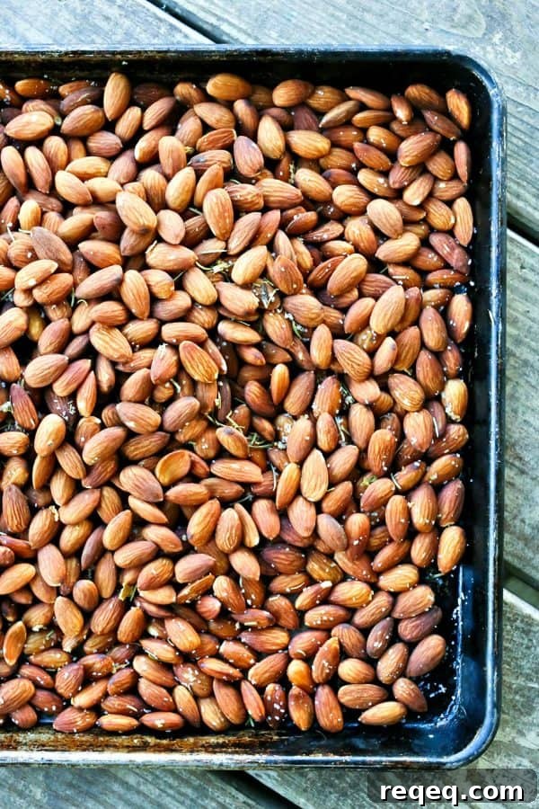 Rosemary Garlic Slow-Roasted Almonds for Snacking 3 Slow Roasted Rosemary Garlic Almonds are an easy, healthy snack for warm weather months.