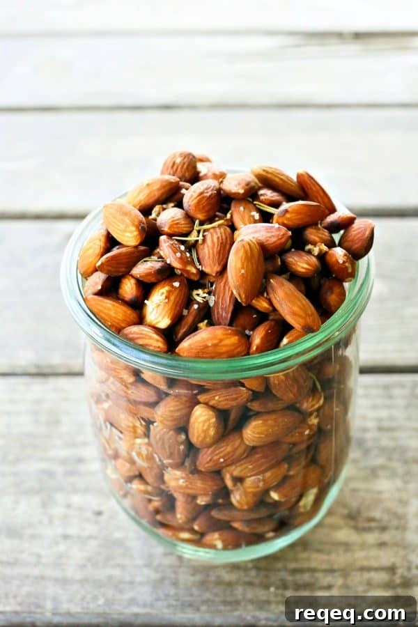 Rosemary Garlic Slow-Roasted Almonds for Snacking 4 Slow Roasted Rosemary Garlic Almonds are an easy, healthy snack for warm weather months.