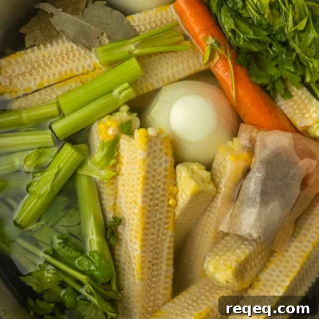 Corn Stalk Care and Harvest Guide: Tips for Stronger Plants 8 corn cobs and vegetables in a stockpot to make corn stock