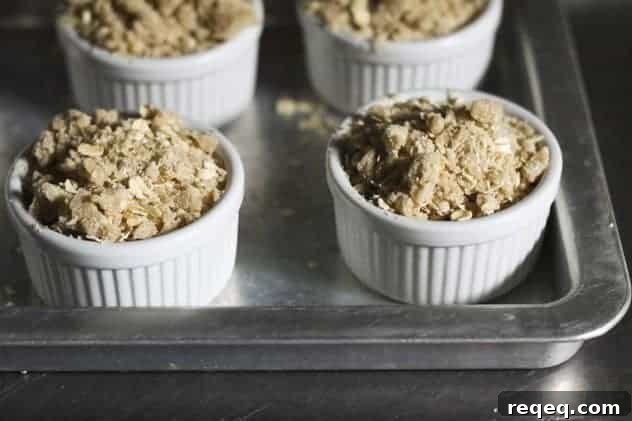 Golden baked fruit crisp topped with make-ahead topping.